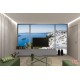 Photo mural view from Santorini in a french window Photo mural view from Santorini in a french window