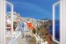 Wallpapers mural panoramic view of Santorini with window - 3 colours