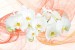 Wall murals white orchids orange on orange abstract background