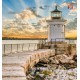 Photo mural white marine lighthouse near and sunset