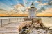 Photo mural white marine lighthouse near and sunset