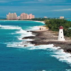 Wallpapers mural lighthouse with a beautiful town background