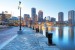 Photo mural city coast with a lamp on a blue background