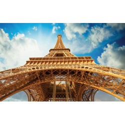 Wall murals Eiffel tower view from below background clouds