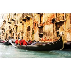 Wall mural a big gondola in the Venice channel Wall mural a big gondola in the Venice channel