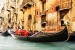 Wall mural a big gondola in the Venice channel