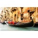Wall mural a big gondola in the Venice channel Wall mural a big gondola in the Venice channel