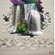Wallpapers mural view of a waterfall with flowers through a brick wall