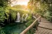 Wallpapers mural forest bridge along waterfall