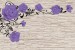 Photo mural purple roses on a stone wall imitation