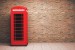 Wallpapers Brick wall with telephone cabin red