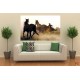 Wall mural with wild horses and a cowboy