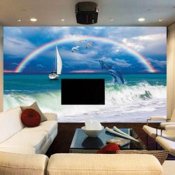 Wall mural sea waves and leaping dolphins with a rainbow background