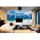 Wall mural sea waves and leaping dolphins with a rainbow background