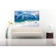 Wall mural sea waves and leaping dolphins with a rainbow background