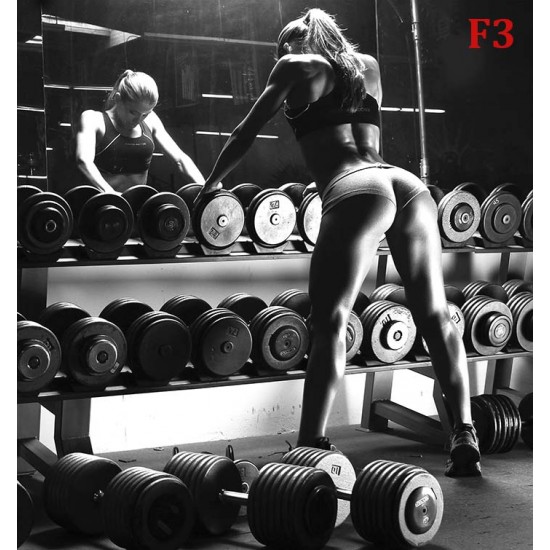 Wallpapers mural woman in the gym in front of a mirror Wallpapers mural woman in the gym in front of a mirror