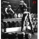 Wallpapers mural woman in the gym in front of a mirror Wallpapers mural woman in the gym in front of a mirror