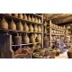 Wall mural Winery demijohns and baskets full of grapes